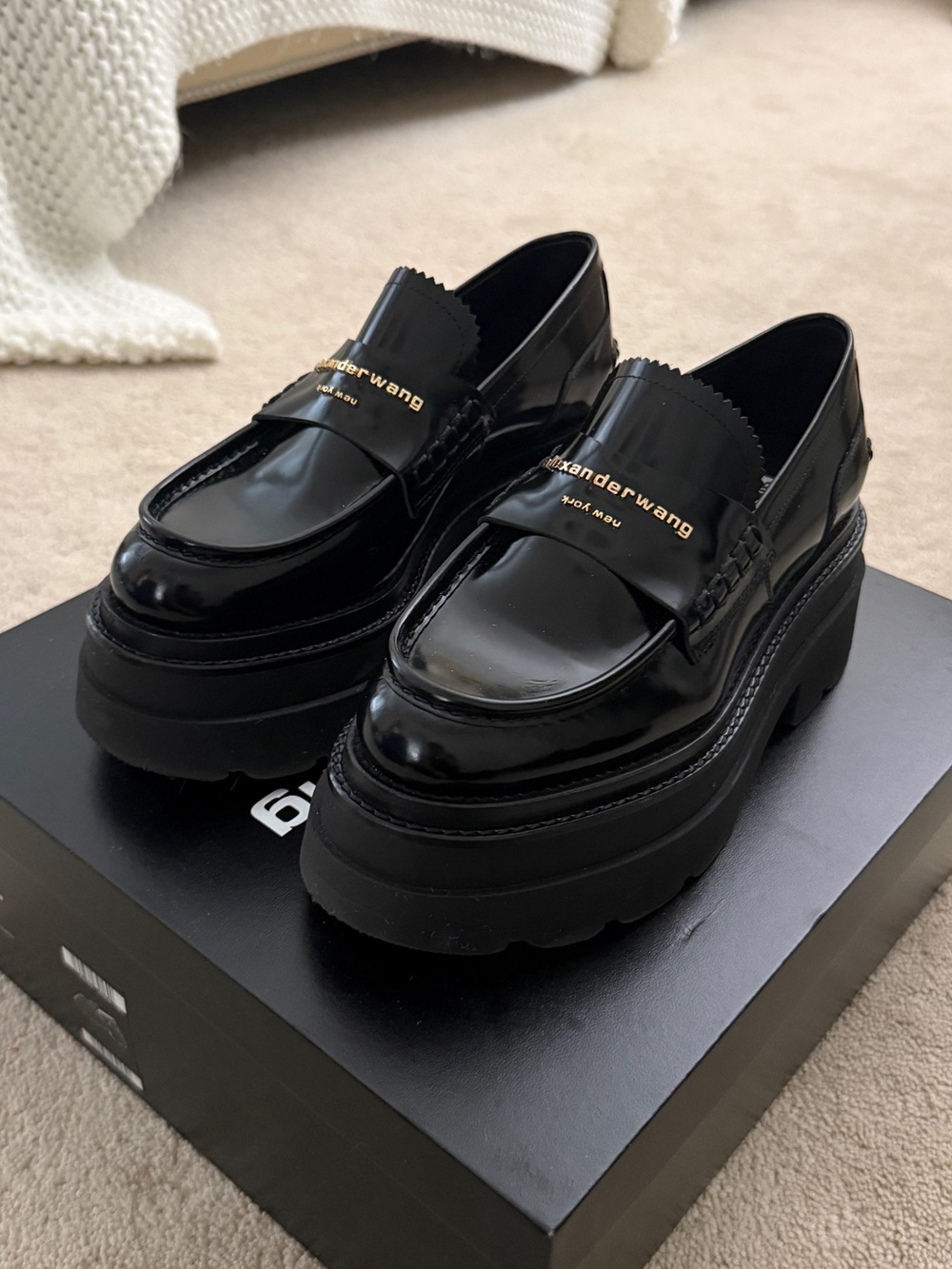 Alexander Wang Glossy Black Platform Penny Loafers with Gold Logo